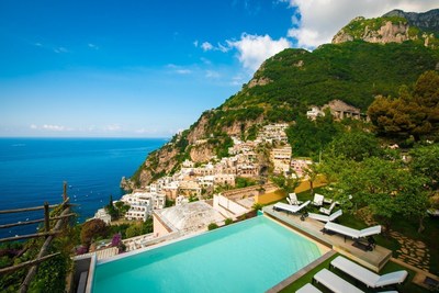Amalfi Coast vacation villa from Carrington Italia's current portfolio of properties, featuring a private garden, pool and view of the cascading houses of Positano