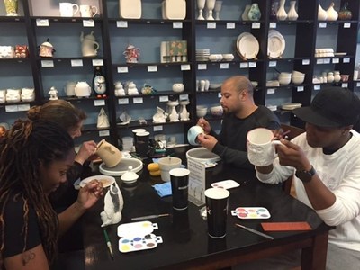 WWP brings warriors and family together to paint pottery and bond.