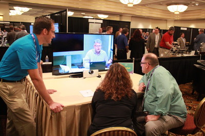 Attendees take part in a hands-on Cisco SpeakerTrack demonstration at NY Tech Summit