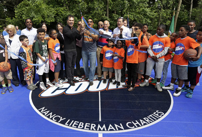 WorldVentures CEO Dan Stammen cuts ribbon at Greenburgh, N.Y. DreamCourt dedication accompanied by WorldVentures Marketing Director and lead fundraiser James Robinson, Greenburgh town officials, and members of the community.