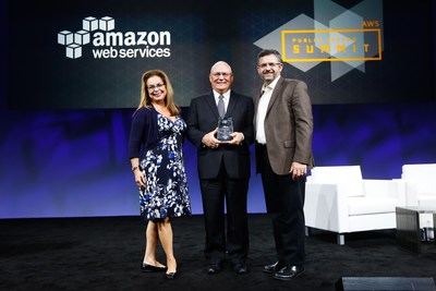 Amazon Web Services (AWS) principal for enterprise sales Rachel Pizarro (LEFT) and general manager for state and local government Frank DiGiammarino (RIGHT) present Robert McKeeman (CENTER), CEO of Utility, with the Partners in Innovation award as part of the 2016 Innovation Challenge. McKeeman received the award at the 2016 Amazon AWS Public Sector Summit in Washington, D.C.