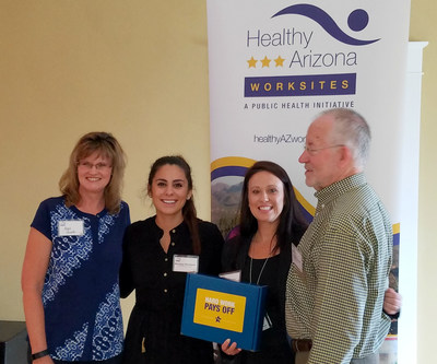 U-Haul VP of Human Resources Angie DeWinter (far left), U-Haul wellness specialist Monique Wantland and U-Haul Chief of Staff Jessica Lopez accept the Gold Standard Award from the Healthy Arizona Worksites Program on June 23 during a ceremony celebrating employers that have instigated evidence-based health initiatives to improve the well-being of their employees, employees' families and communities.
