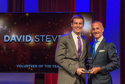 Aramark's Chairman, President and CEO, Eric Foss, presents David Stevens with company's 2016 Volunteer of the Year award, in recognition of his commitment to volunteer service and leadership in his community.