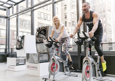 Malin Akerman, left, star of Showtime's hit show Billions, spins tirelessly alongside Cyc Fitness founder Keoni Hudoba at LG's 'Fit-Fashion' event Wednesday, June 29, 2016 in New York. A celebrity fitness enthusiast, Malin uses the LG SideKick to protect her favorite workout gear with its Active Wear-specific cycle.