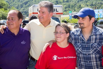 (from the left); Governor Earl Ray Tomblin (D-WV) Governor of WV; U.S. Senator Joe Manchin (D-WV), Tracie Hays - Save the Children Staffer, Country Music Superstar and one of West Virginia's own Brad Paisley during a visit to give aid to flood survivors in Clendenin, WV.