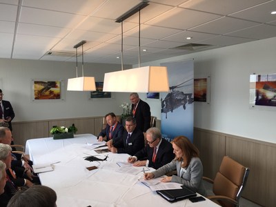 Sikorsky signed a memorandum of understanding with Polska Grupa Zbrojeniowa (PGZ), Poland's industry armaments group during the Farnborough International Airshow. PGZ will have significant involvement in production of the international BLACK HAWK helicopter should the Polish Government order BLACK HAWK aircraft from Sikorsky's PZL Mielec facility. Signing the MOU are Nathalie Previte, vice president, Sikorsky Strategy and Business Development, Arkadiusz Siwko, PGZ president, Janusz Zakrecki, president of PZL Mielec and Radosław Obolewski, Member of the PGZ Management Board.