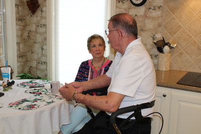 Gregory Gedovin, 70, talks with registered nurse Michelle Cooper, who was sent to his home by his Medicare Advantage health plan, WellCare of Texas. The visit is part of WellCare's new field-based care management program, designed to deliver personalized, cost-efficient care for medically-complex Medicare Advantage members.