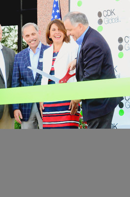CDK Global leaders officially open their Customer Experience Center in Cincinnati, Ohio. (L-R) Bob Karp, president, North America, Yvonne Surowiec, Chief Human Resources Officer, and Brian MacDonald, Chief Executive Officer.