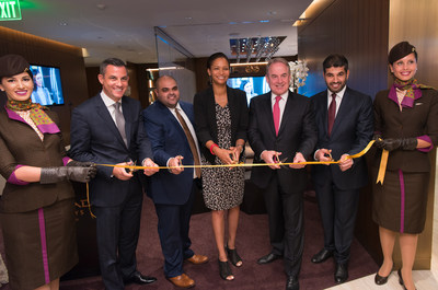 Pictured flanked by Etihad Airways First & Business Class Lounge Los Angeles staff are, from left: Martin Drew, Etihad Airways Senior Vice President for the Americas, Haitham Al Subaihi, Etihad Airways Director of Visual Communications, Deborah Flint, Los Angeles World Airports Chief Executive Officer, James Hogan, Etihad Aviation Group President and Chief Executive Officer, and Hareb Al Muhairy, Etihad Airways Senior Vice President Corporate and International Affairs, celebrate the official opening of the Etihad Airways First & Business Class Lounge Los Angeles.