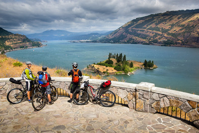 Bicyclists enjoy the view of the Columbia River on the Historic Columbia River Highway, celebrating its Centennial Anniversary
