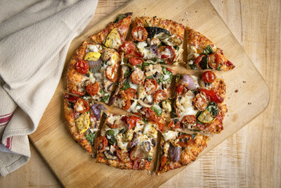 UNO Veggie Extravaganza Thin Crust Pizza  House-roasted red onions peppers zucchini yellow squash and tomatoes with baby spinach mushrooms mozzarella aged cheddar and Romano cheeses