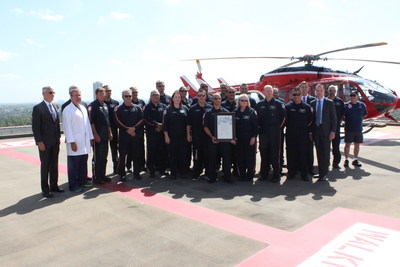 Members of the Memorial Hermann Life Flight crew gather on the John S. Dunn Heliport at Memorial Hermann-Texas Medical Center to celebrate the program's 40th anniversary.