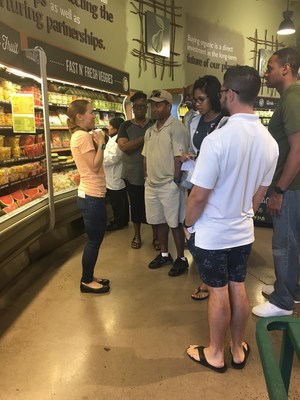 Wounded veterans tour a Whole Foods and ask questions about their dietary habits, during a recent nutrition course hosted by Wounded Warrior Project.