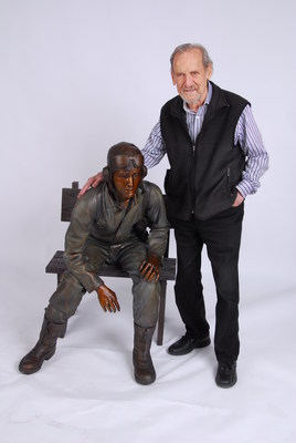 Major Fredric Arnold, USAAC (ret.) stands with TEENAGER, one of twelve life-size bronze statues he created to honor the 88,000 American Airmen who died in WWII.