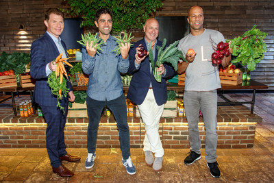 Bobby Flay, Adrian Grenier, Tom Colicchio and Common snap a fruit and vegetable selfie at Naked Juice's #DrinkGoodDoGood campaign launch event in Manhattan. For every selfie shared using the campaign hashtag, Naked Juice will donate 10 pounds of produce to communities in need.