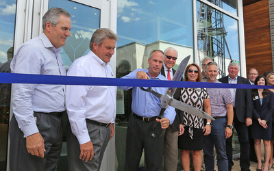 Vista Outdoor CEO Mark DeYoung cuts the ribbon on the company's new corporate headquarters in Farmington, Utah