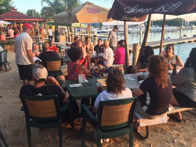 Wounded warriors recently enjoyed getting dinner together during a monster stand-up paddleboarding competition at a program gathering with Wounded Warrior Project in Middle River, Maryland.