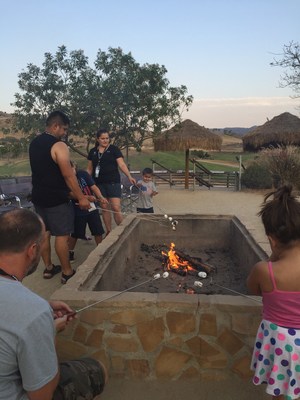 Injured veterans and their families gathered around the campfire to make s'mores during a recent Wounded Warrior Project outing at the San Diego Zoo Safari Park.