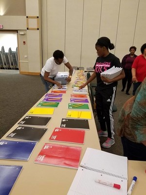 Volunteers stack up supplies at a recent back-to-school giveaway in Killeen, Texas. Wounded Warrior Project teamed up with Jamaica Giving Heart Inc. to help students gear up.