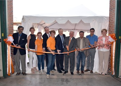IACMI-The Composites Institute and The University of Tennessee Knoxville leaders dedicated a revitalized University of Tennessee building devoted to composites manufacturing and engineering. The facility space complements regional resources and provides experiential learning for next generation engineers- undergraduate and graduate students in a real world manufacturing setting. Photo above: (left to right) UT-ORNL Governor's Chair and IACMI CTO, Uday Vaidya; University of Tennessee Teaching Asistant, Emily King; University of Tennessee Engineering Student, Mary Daffron; University of Tennessee Vice Chancellor of Research and Engagement and IACMI Board Chair, Taylor Eighmy; University of Tennessee Engineering Student, Jimmy Bray; IACMI CEO, Craig Blue; University of Tennessee Dean of Engineering, Wayne Davis; President of Resource Fiber, Lee Slaven; Volkswagen Mechanical Engineer, Michael Rademacher; IACMI COO Renae Speck.