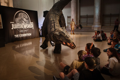 Day campers at Philadelphia's The Franklin Institute were awestruck by the arrival of a live Raptor during NBCUniversal Brand Development and Imagine Exhibitions' announcement unveiling the North American premiere of Jurassic World: The Exhibition. Bringing guests closer than ever before to real-life dinosaurs, Jurassic World: The Exhibition offers a rare look at life-size dinosaurs, set in themed environments inspired by Jurassic World, one of the largest blockbusters in cinematic history. Jurassic World: The Exhibition opens November 25, 2016 at the renowned Franklin Institute. More information can be found at JurassicWorldTheExhibition.com. (Photo courtesy: Daryl Peveto)