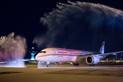 A Royal Air Maroc Boeing 787 Dreamliner taxis under a water cannon salute at Washington Dulles International Airport during an official welcome ceremony for the inaugural flight from Casablanca to Washington, D.C.