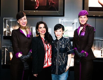 (From left to right, flanked by Etihad Airways cabin crew), Amina Taher, Head of Corporate Communications - Etihad Airways and Sandra Choi, Creative Director - Jimmy Choo celebrate the opening of the Jimmy Choo VIP Lounge hosted by Etihad Airways and WME | IMG at Skylight at Moynihan Station.