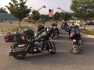 Motorcycles are lined up for the Second Annual Ride with the Heroes. A group of injured veterans with Wounded Warrior Project escorted hundreds of motorcycle riders across Maryland on a 65-mile rural tour. The ride is an annual community event that recognizes service members including military, firefighters, and police.