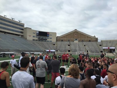 Wounded veterans and their guests tour the University of Wisconsin football stadium.