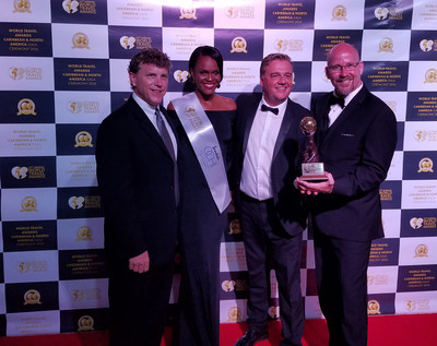 Brad Bennett (far right) and Brian Houser (far left) accept the award for North America's Leading Travel Club on behalf of DreamTrips at the 23rd annual World Travel Awards(TM) presented at the Caribbean & North America Gala Ceremony on Sep. 17 in Ocho Rios, Jamaica.