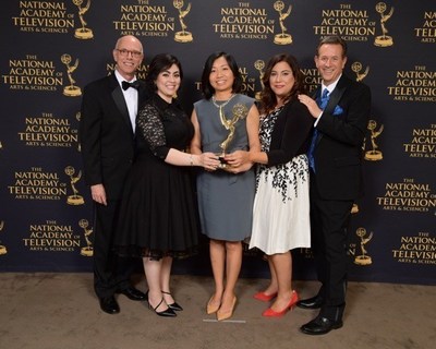 'Full Frame' Team of China Central Television America received EMMY Award for "outstanding magazine feature" in New York. Left to right: Ira Lazernik - Director; Monna Kashfi - Full Frame Executive Producer ; Mei Yan - CCTV America Managing Editor; Sahar Sarshar - Segment Producer; Mike Walter - Full Frame host.