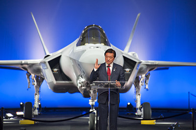 Kenji Wakamiya, Japan's State Minister of Defense, addresses the ceremony audience as Japan's first F-35A aircraft is revealed at the Lockheed Martin's production facility in Fort Worth, Texas, Sept. 23. Lockheed Martin photo by Beth Steel
