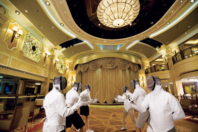 Fencing is among several skills that some passengers on cruise ships enjoy learning while on vacation.  (Photo courtesy of Cunard Line)