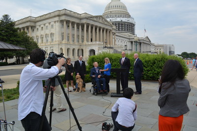 Families talk to the media outside the US Capitol in June about the need for reproductive services coverage for wounded veterans including in vitro fertilization.