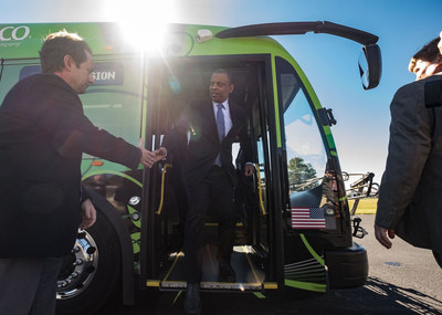 US Transportation Secretary Anthony R. Foxx disembarks from an electric bus during a visit to the International Transportation Innovation Center. Foxx was there to observe some of the latest automated vehicle technology in development.
