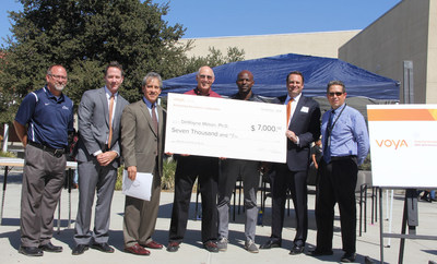 DeWayne Mason, a teacher at Patriot High School in Jurupa Valley, California, is the third place winner in the 2016 Voya Unsung Heroes awards competition. Dr. Mason is wearing red and standing in the center of the picture.