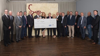 Oct. 4, 2016- In honor of 1,000 shows, AEG and Caesars Entertainment executives present Celine Dion with a $100,000 donation to the Azar/ Angelil Oncology Research Fund. - Photo by: Cashman Photo