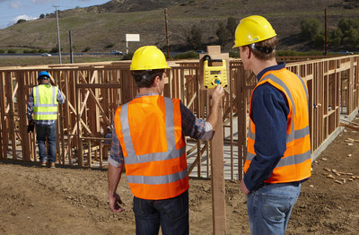 Remote workers clocking in on JobClock Hornet at a job site. Time punches are automatically transmitted to the office via cellular communication network.