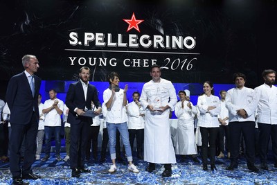 U.S. Chef Mitch Lienhard of Manresa restaurant in California is crowned S.Pellegrino Young Chef 2016--winner of the global culinary event hosted by S.Pellegrino Sparkling Natural Mineral Water--in Milan on October 15, 2016, alongside his Mentor Chef Dominique Crenn. (Photo courtesy of S.Pellegrino)
