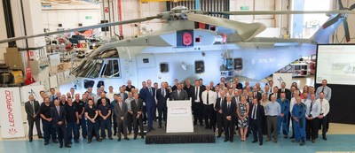 Members of the Industry team of Lockheed Martin and Leonardo mark a major milestone of the delivery of the 30th and final Merlin Mk2 to the UK's Ministry of Defence.