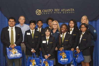 Aaron's, Inc., a leader in the sales and lease ownership and specialty retailing of furniture, consumer electronics, home appliances and accessories, has partnered with the Cristo Rey Jesuit High School Corporate Work Study Program to provide eight high school students with a work/study program during the 2016-2017 school year. (L to R): Cristo Rey students Luis Montoy, Aaron's Jeff Stine, Adrian Rodriguez, Alfonso Pena, Trish Nguyen, Kennedy Harris, Aaron's Beth Van Loon, Aliyah Crawford, Stephanie...