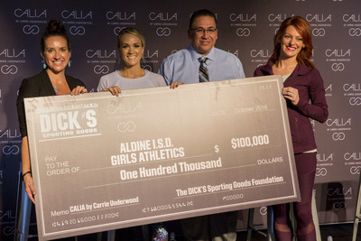 CALIA by Carrie Underwood in partnership with The DICK'S Sporting Goods Foundation's Sports Matter program surprises unsuspecting athletes and coaches of the Aldine Independent School District with a $100,000 check donation at the DICK'S Sporting Goods Grand Opening Celebration at Baybrook Mall in Friendswood, TX on October 21, 2016. (Photo by Scott Dalton/Invision for DICK'S Sporting Goods/AP Images)