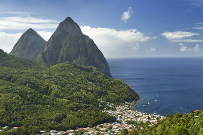 The beauty of St. Lucia awaits Disney Cruise Line guests when the Disney Wonder sails seven-night Southern Caribbean cruises from San Juan, Puerto Rico in 2018. Distinguished by twin mountain peaks, the Pitons, the island of St. Lucia is covered in lush rainforest, cascading waterfalls and white sand beaches (Kent Phillips, photographer)