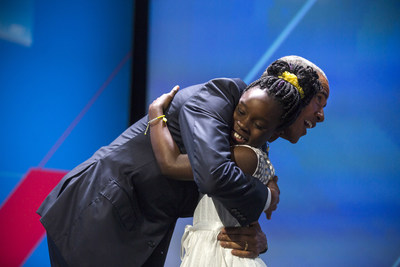 US President Barack Obama hugs 11-year-old Mikailia Ulmer who introduced him at the first-ever United State of Women Summit at the Walter E. Washington Convention Center in Washington, DC, USA, 14 June 2016. Attendees also included the First Lady Michelle Obama and TV personality Oprah Winfrey.  EPA/JIM LO SCALZO