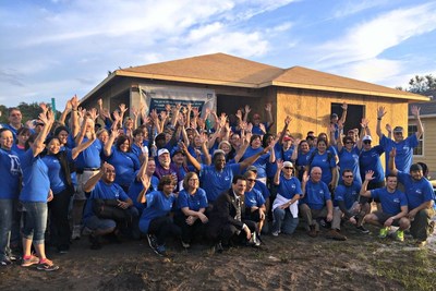 National Association of Realtors(R) President Tom Salomone joins more than 100 Realtors(R) at a Habitat for Humanity volunteer build day to kick off the 2016 REALTORS(R) Conference & Expo.