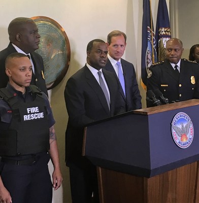 Atlanta Mayor Kasim Reed, at podium, joined by Georgia Power CEO Paul Bowers and Atlanta Police Chief George Turner announce a $900,000 donation to the Atlanta Police Foundation to purchase tactical body armor including bulletproof vests and helmets for Atlanta police officers.