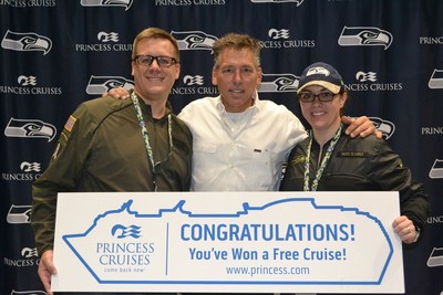 (From left to right) Military Veteran and Purple Heart recipient Matthew Linville, Legendary Seahawks Quarterback Jim Zorn, and Military Veteran Brittney Linville in Seattle on Monday.
