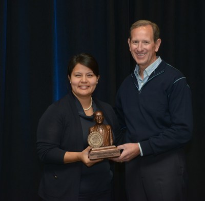 Misty Fernandez, recipient of Georgia Power's inaugural Preston Arkwright Award for service, receives the award from Paul Bowers, chairman, president and CEO of Georgia Power.