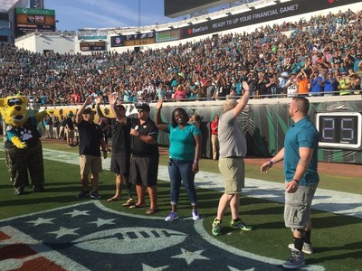 Wounded veterans served by Wounded Warrior Project wave to the crowd during the NFL Salute to Service Game in Jacksonville, FL.