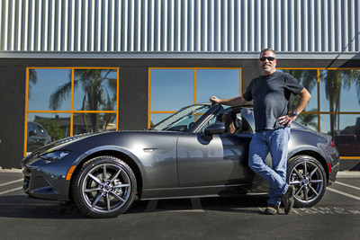 Dave Putter, the first customer in the U.S. to take delivery of his 2017 Mazda MX-5 Miata RF Launch Edition, poses at Huntington Beach Mazda with his 16th Mazda and his eighth MX-5 Miata.